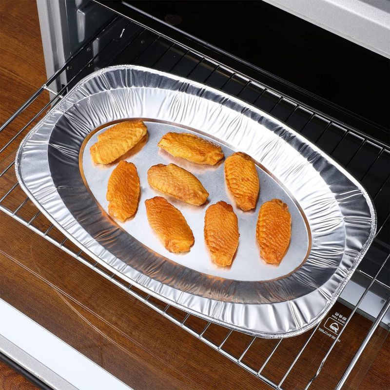 Pan de poisson en aluminium en aluminium en relief ovale jetable
